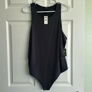 Sleeveless High Neck Body Contour Bodysuit